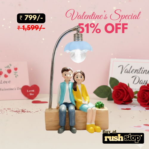 Lovely Couple Sitting Under LED Street Lamp Showpiece