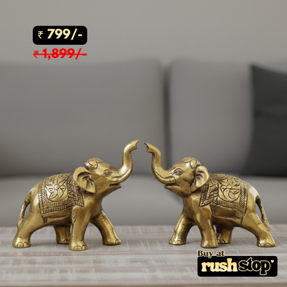 Artisan golden metal elephant duo decorative showpiece