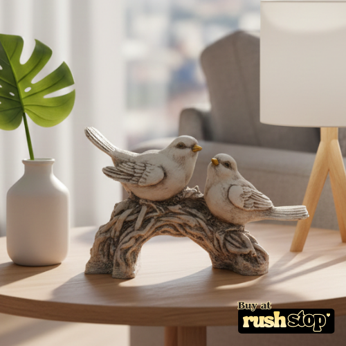 Vintage-style white bird decor statue on branch for farmhouse and cottage interiors