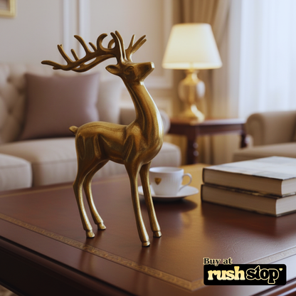 Golden Brass Reindeer figurine on a Coffee table 