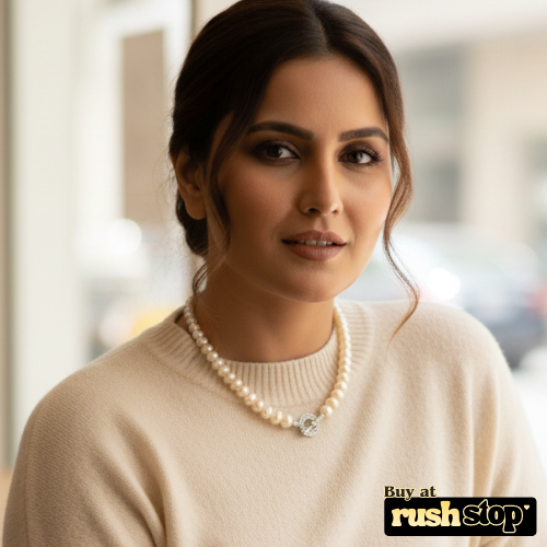 Handcrafted natural freshwater pearl necklace with creamy ivory 10mm pearls and gold-toned barrel clasp