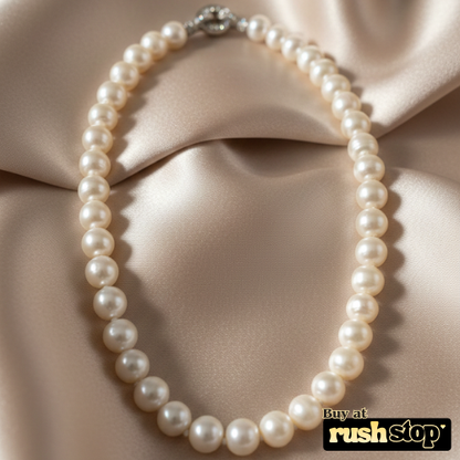 Handcrafted natural freshwater pearl necklace with creamy ivory 10mm pearls and gold-toned barrel clasp