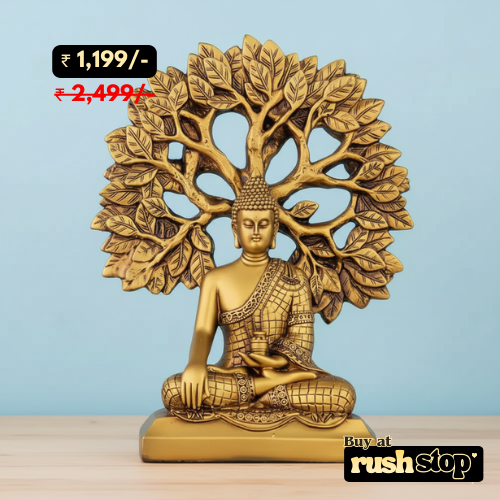 Golden meditating Buddha statue under Bodhi tree decor