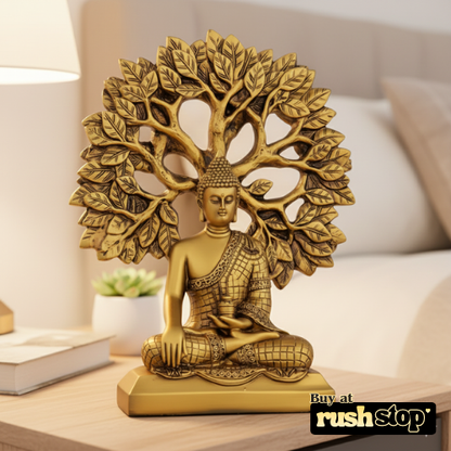 Golden meditating Buddha statue under Bodhi tree decor