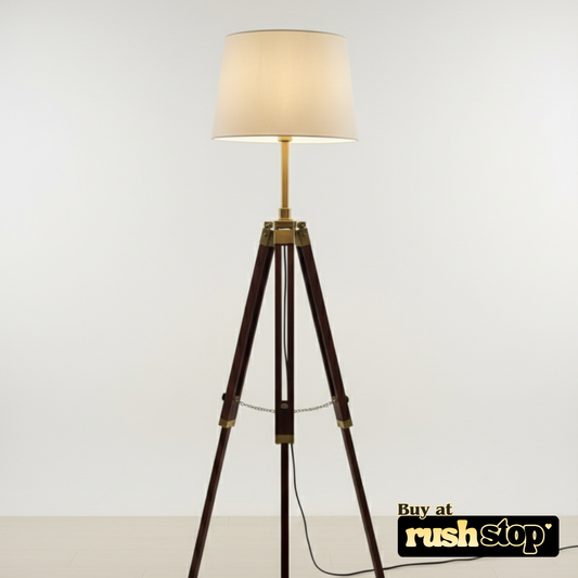 Tripod floor lamp with a beige shade on a white background, featuring 'rushstop' branding.