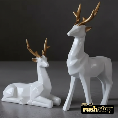 Modern geometric hiran figurines in matte white resin with gold antlers