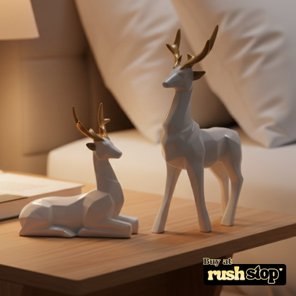 Modern geometric hiran figurines in matte white resin with gold antlers