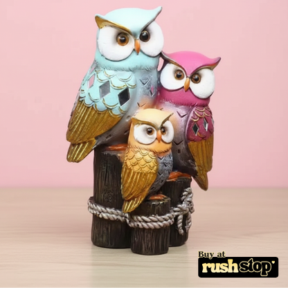 Colorful owl family trio resin figurine with blue pink and orange finish