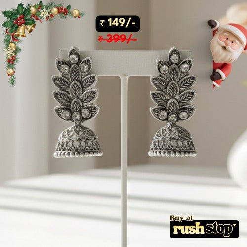 Antique oxidized silver leaf pattern jhumka earrings with crystal accents and bell shaped dangler