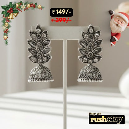 Antique oxidized silver leaf pattern jhumka earrings with crystal accents and bell shaped dangler