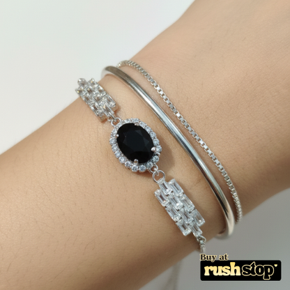 Black onyx crystal bolo bracelet with silver toned adjustable slider chain