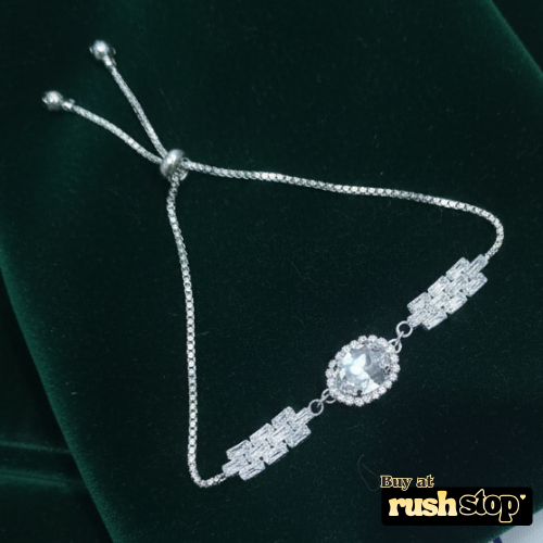 Elegant silver crystal statement bracelet with oval center stone