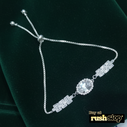 Elegant silver crystal statement bracelet with oval center stone