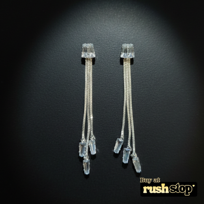 Long chain crystal drop earrings with cascading snake chains and clear baguette crystals by Veera