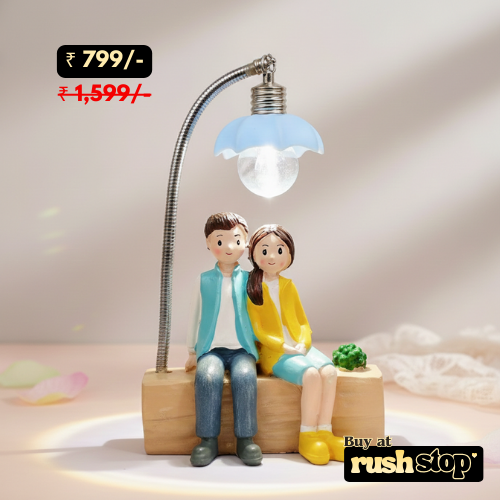 Lovely Couple Sitting Under LED Street Lamp Showpiece