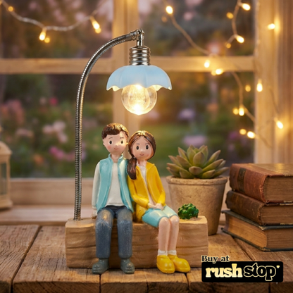 Lovely Couple Sitting Under LED Street Lamp Showpiece