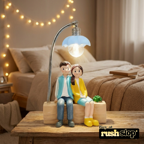 Lovely Couple Sitting Under LED Street Lamp Showpiece