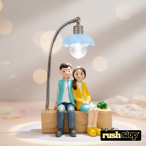 Lovely Couple Sitting Under LED Street Lamp Showpiece