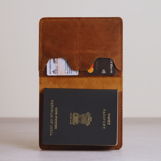 Brown leather wallet with cards and a passport on a light background