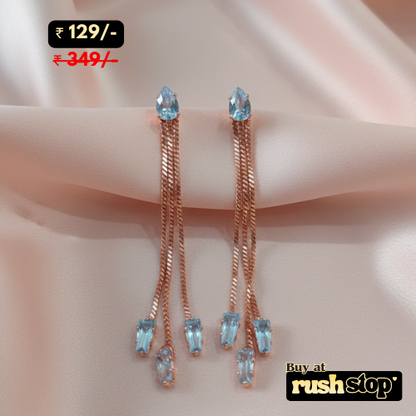 Rose gold multi chain crystal dangle earrings with blue and clear baguette crystals