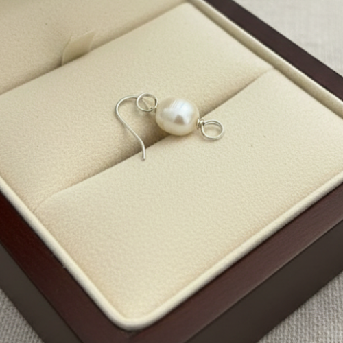 Lustrous natural freshwater pearl drop charm pair