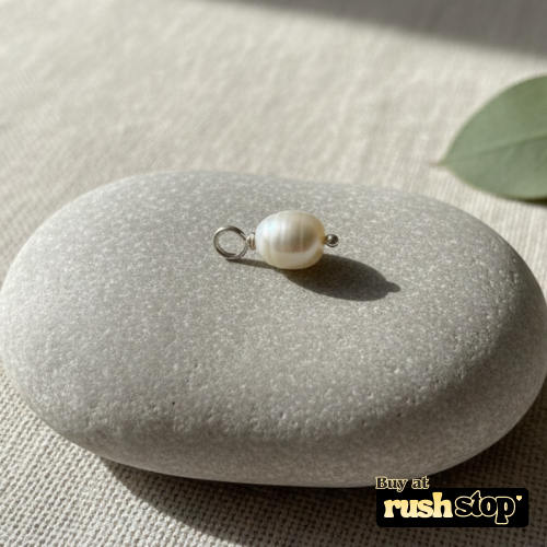 Lustrous natural freshwater pearl drop charm pair