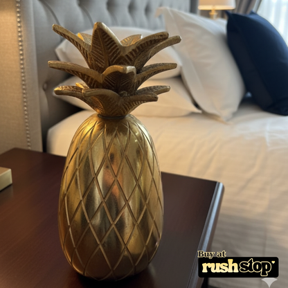Golden pineapple table decor from Rush Stop, suited for modern resin figurine and handcrafted decor India setups.