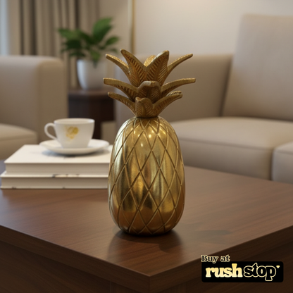 Golden pineapple table decor from Rush Stop, suited for modern resin figurine and handcrafted decor India setups.