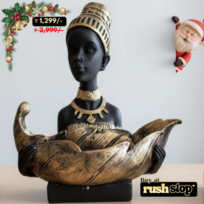 Handcrafted African lady sculpture holding decorative leaf bowl