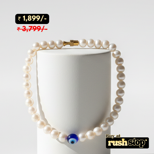 Handmade freshwater pearl nazar bracelet with evil eye charm