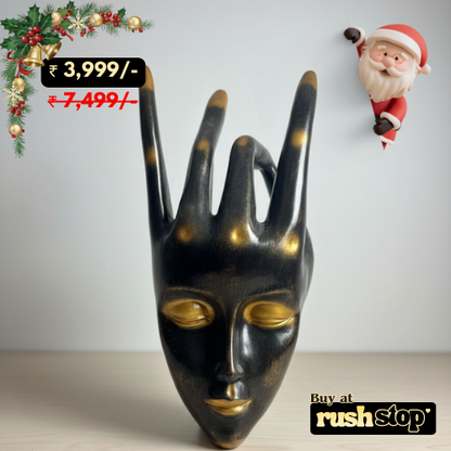 Black and gold decorative mask with Christmas decorations and Santa Claus figure on a white background.