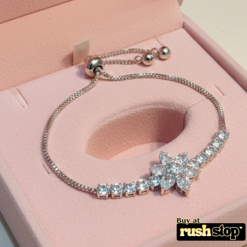 Sparkling floral crystal bolo bracelet adjustable silver tone