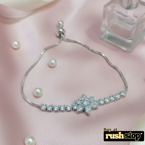 Sparkling floral crystal bolo bracelet adjustable silver tone