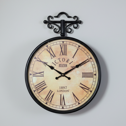 Vintage-style wall clock with Roman numerals on a light gray background