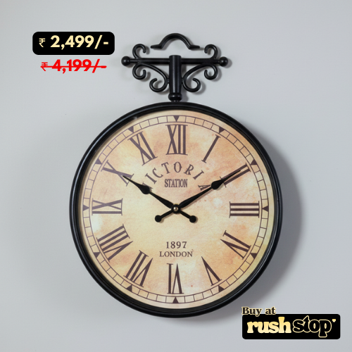 Vintage Victoria London double sided station wall clock with Roman numerals and antique metal frame